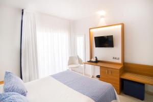 Posteľ alebo postele v izbe v ubytovaní Ibersol Torremolinos Beach