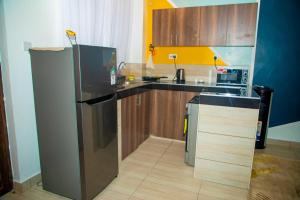 a kitchen with a sink and a counter top at Nay homes - Mtwapa pride in Mtwapa