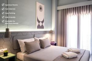 Posteľ alebo postele v izbe v ubytovaní apt.27-103