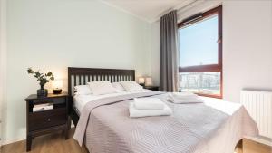Posteľ alebo postele v izbe v ubytovaní Apartments Jaglana with Parking & SPA