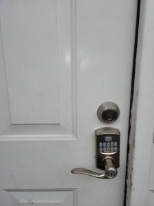 a bathroom door with a door knob and a lock at Daphy Ruby Floor 2 in Newark