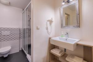 Kúpeľňa v ubytovaní EA ApartHotel Melantrich
