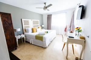 Postel nebo postele na pokoji v ubytování Hotel Siesta Holbox
