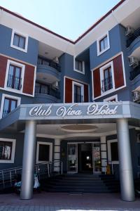 a building with a sign on the front of it at Club Viva Hotel in Marmaris