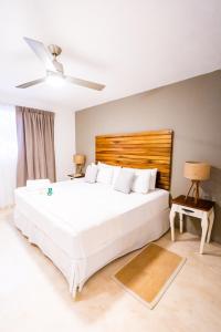 Postel nebo postele na pokoji v ubytování Hotel Siesta Holbox
