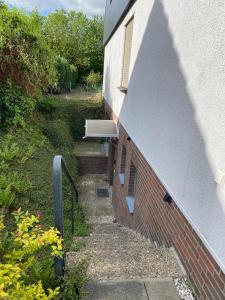 a stairway leading up to a brick building at Ferienwohnung in Bad Segeberg in Bad Segeberg
