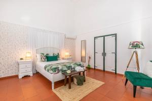 En eller flere senge i et værelse på Herdade das Castas Nobres + 65 billeder