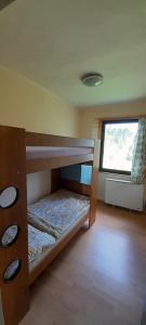 Postel nebo postele na pokoji v ubytování Chata Julka