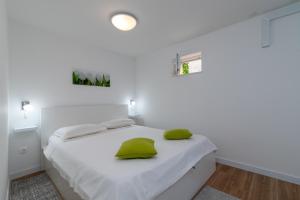 Voodi või voodid majutusasutuse Apartman Benzon Vranjic - 4 zvjezdice toas