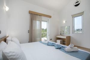 Postel nebo postele na pokoji v ubytování Summer Dream Villa