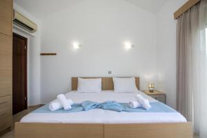 Postel nebo postele na pokoji v ubytování Summer Dream Villa