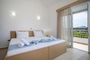 Postel nebo postele na pokoji v ubytování Summer Dream Villa