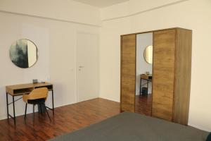 Postel nebo postele na pokoji v ubytování Alexander House Verona