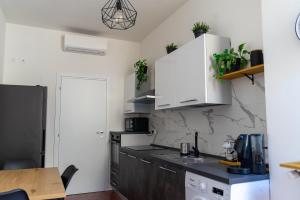Kuchyň nebo kuchyňský kout v ubytování Alexander House Verona