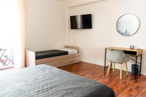 Postel nebo postele na pokoji v ubytování Alexander House Verona