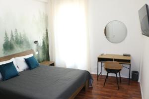 TV a/nebo společenská místnost v ubytování Alexander House Verona
