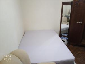 Postel nebo postele na pokoji v ubytování Chambre à petit budget pour personne simple