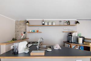 Cucina o angolo cottura di Stone house and dependance 7 pers