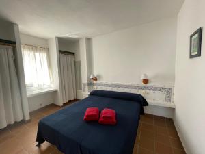 Postel nebo postele na pokoji v ubytování ERMITA by SOM Menorca