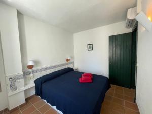 Postel nebo postele na pokoji v ubytování ERMITA by SOM Menorca
