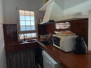 Kuchyň nebo kuchyňský kout v ubytování ERMITA by SOM Menorca