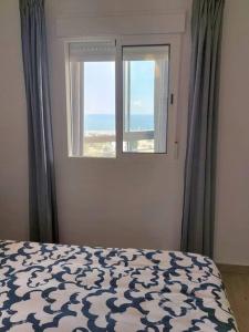Posteľ alebo postele v izbe v ubytovaní Macarena´s Home *Sea view*-Saltillo Alto