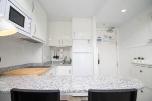 Kuchyň nebo kuchyňský kout v ubytování Ocean House Bloque 3 Planta 1 By IVI Real Estate