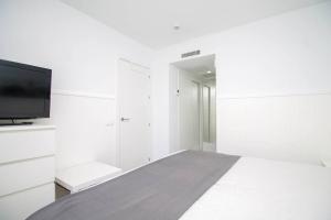 TV a/nebo společenská místnost v ubytování Ocean House Bloque 3 Planta 1 By IVI Real Estate