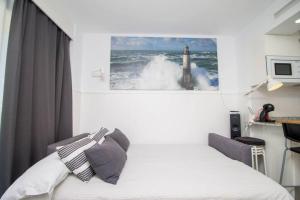 Postel nebo postele na pokoji v ubytování Ocean House Bloque 3 Planta 1 By IVI Real Estate