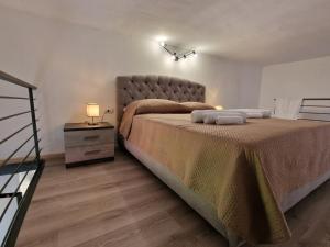 Een bed of bedden in een kamer bij Casa MARFI