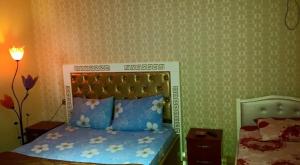 Hotel Buza 객실 침대