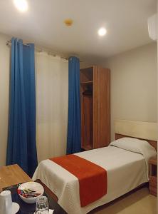 Ένα ή περισσότερα κρεβάτια σε δωμάτιο στο Duncan Guesthouse