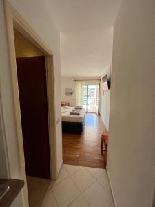Postel nebo postele na pokoji v ubytování Apartments Šuda