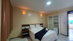 Postel nebo postele na pokoji v ubytování Hotel Monólitos + 29 fotografií