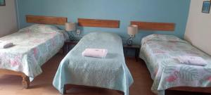 Rúm í herbergi á Hostal don Felipe