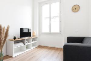 TV a/nebo společenská místnost v ubytování MontSéjour - Logement Climatisé Netflix, Mezzanine