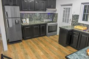 Fotografie z fotogalerie ubytování Villa De Cruz - Executive Suite v destinaci Scarborough