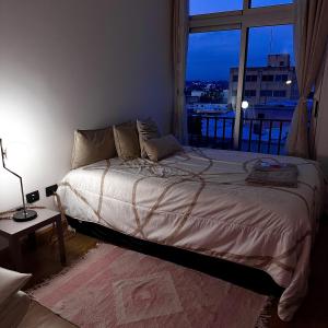 Entre Rosas y Flores tesisinde bir odada yatak veya yataklar