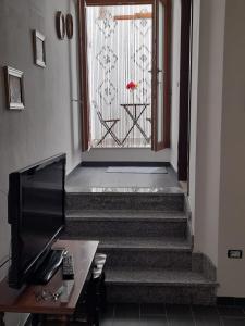 TV a/nebo společenská místnost v ubytování Casa Santina