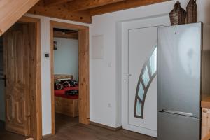 Kuchyň nebo kuchyňský kout v ubytování Apartmaji Gračner