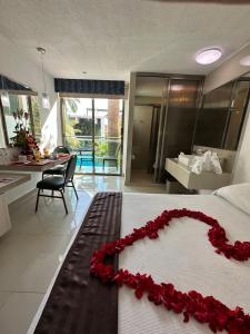 Postel nebo postele na pokoji v ubytování Hotel Plaza Caribe
