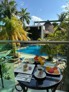 Bazén v ubytování Hotel Plaza Caribe nebo v jeho okolí