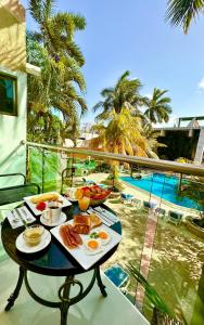 Bazén v ubytování Hotel Plaza Caribe nebo v jeho okolí