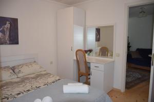 Un pat sau paturi într-o cameră la Guest House Ilto