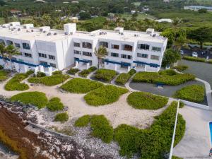 an aerial view of a large white building at Gorgeous Ocean Views! Welcome to Bella Breeze! BeachFront 2BR 2BA in Sion Farm