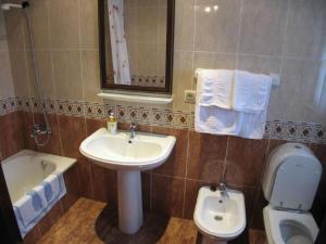 Koupelna v ubytování Hotel Alonso