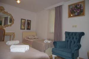Un pat sau paturi într-o cameră la Guest House Ilto