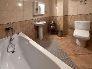 Koupelna v ubytování Dream House + 29 fotografií