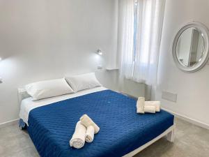 Postel nebo postele na pokoji v ubytování Tea House Alghero + 18 fotografií