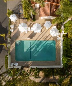 an overhead view of a swimming pool in a backyard at The Franciscan Hotel in Santa Barbara